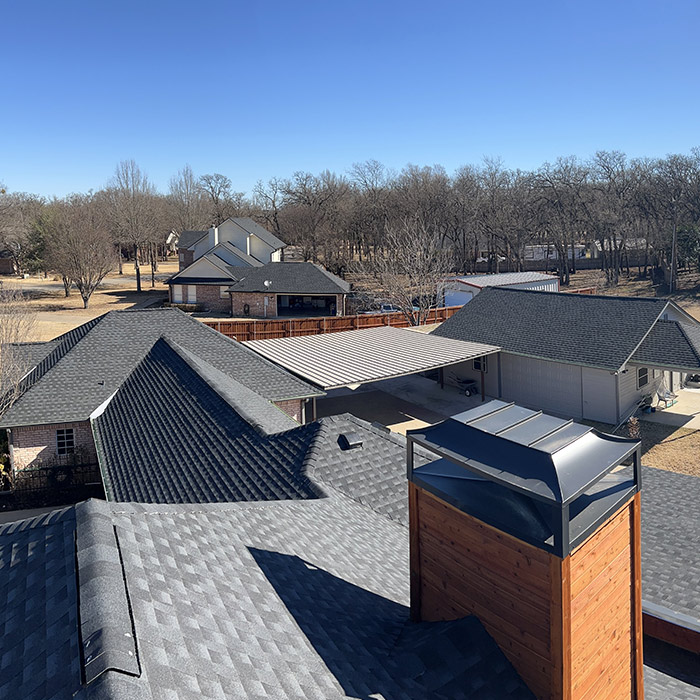 A view of the roof line of a suburban area.